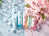 Beauty On Command cleansers collection artfully arranged with fresh spring flowers, crystals, and morning dew drops, showcasing the transition from rich winter to light spring textures
