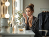 Successful businesswoman in her 40s applying morning skincare routine in natural light, demonstrating professional self-care habits